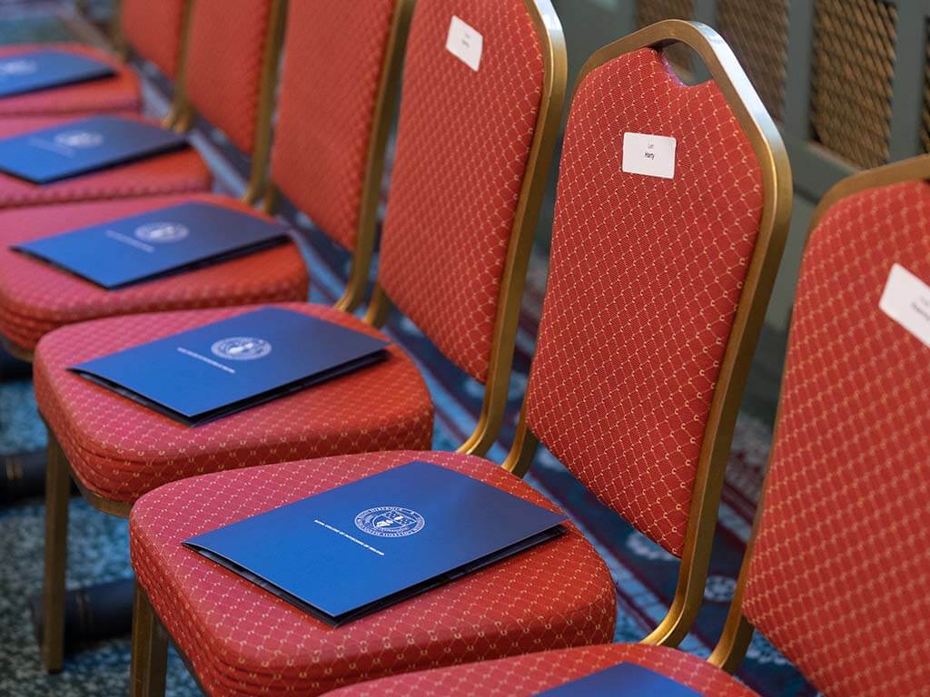 Conferring booklets set out on seats